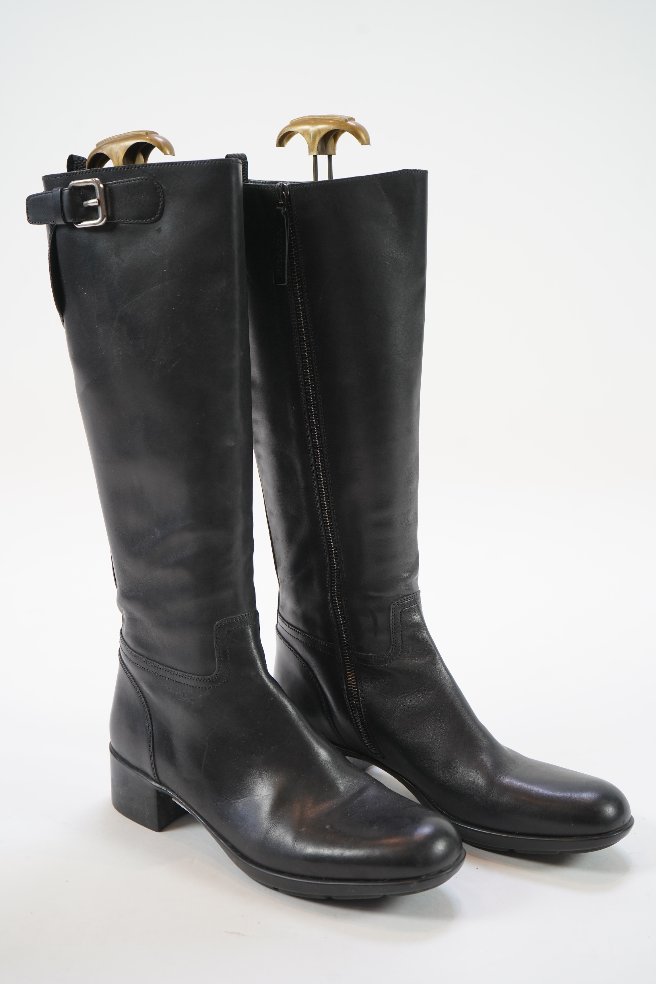 A pair of lady's Prada black leather boots and a pair of Russell & Bromley platform black leather knee high boots. size EU 40 (approx UK size 7.5)